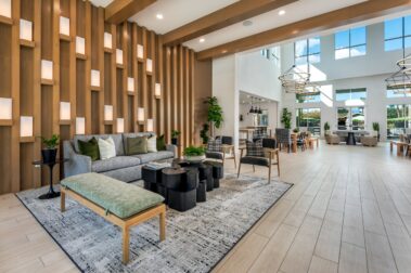 interior lobby shot with couches, large open windows and relaxing environment